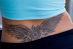female_lower_back_tattoo